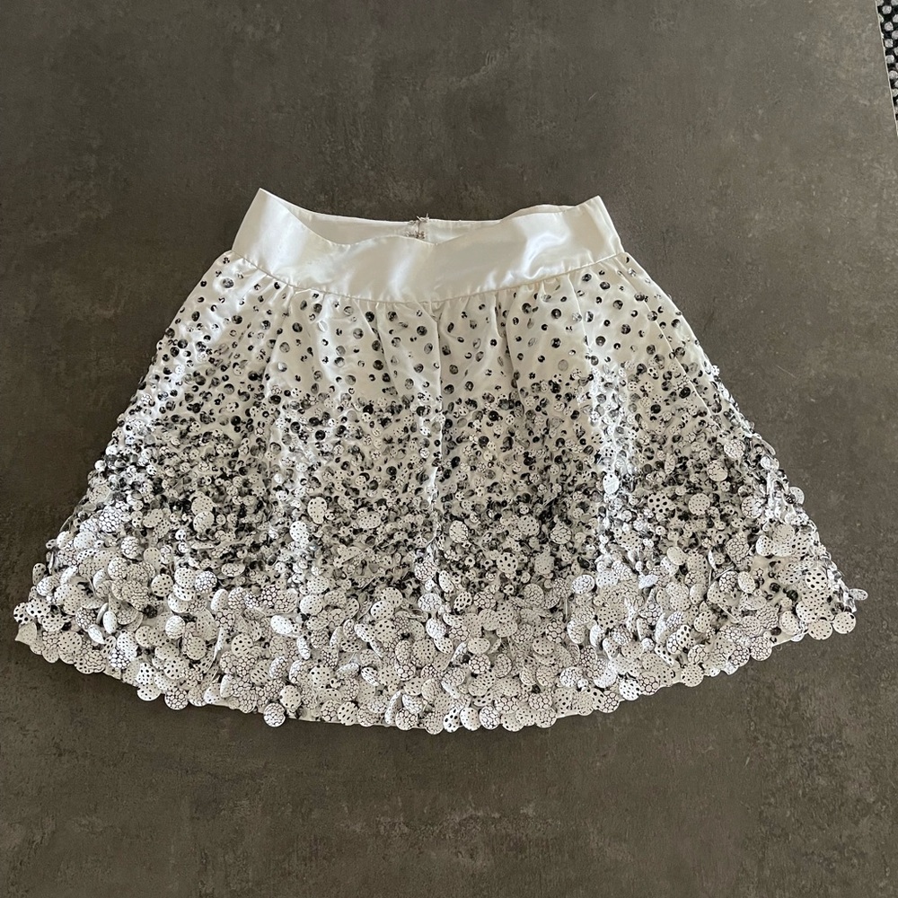 Manish Arora sequenced black and white mini skirt.